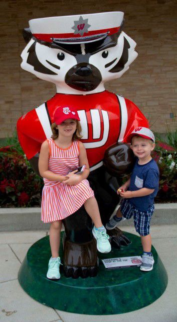 Meryl Mixtacki's grandchildren with Bucky statue